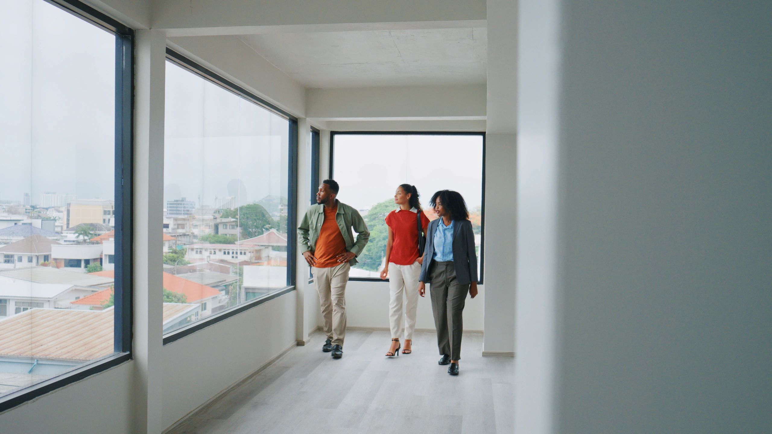 Real estate professional presenting a modern office space